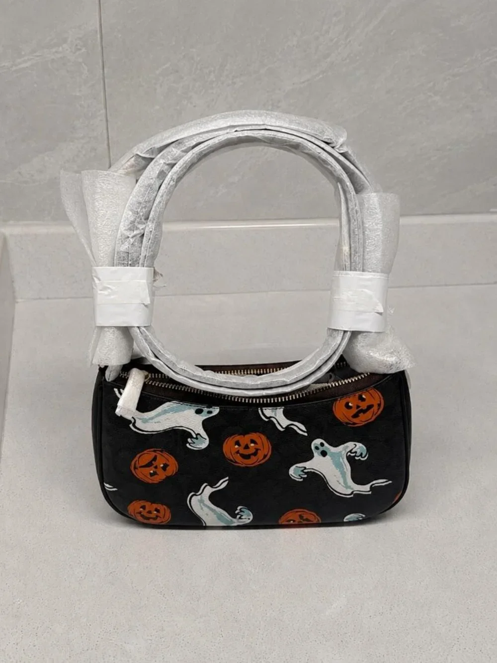 Coach features signature